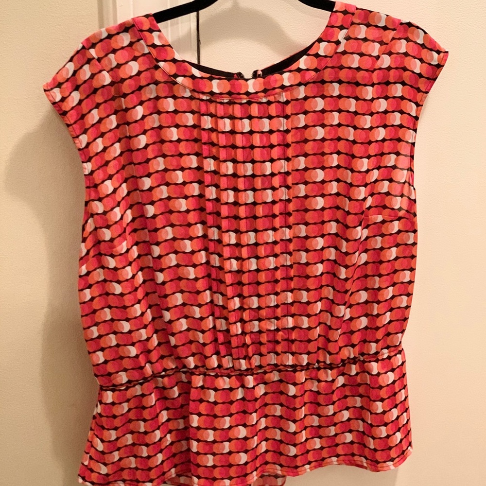 Drop waist sleeveless blouse
